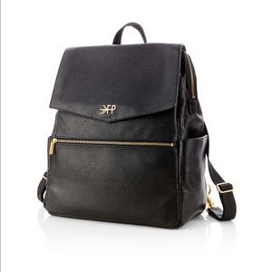 Freshly picked black leather diaper bag from crate and barrel